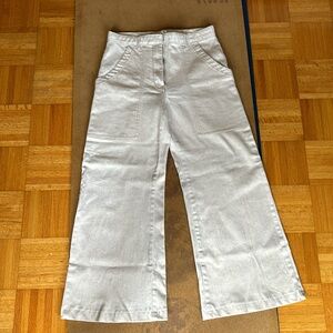 Linen/cotton/spandex bellbottoms. Off white with gold metallic threading.